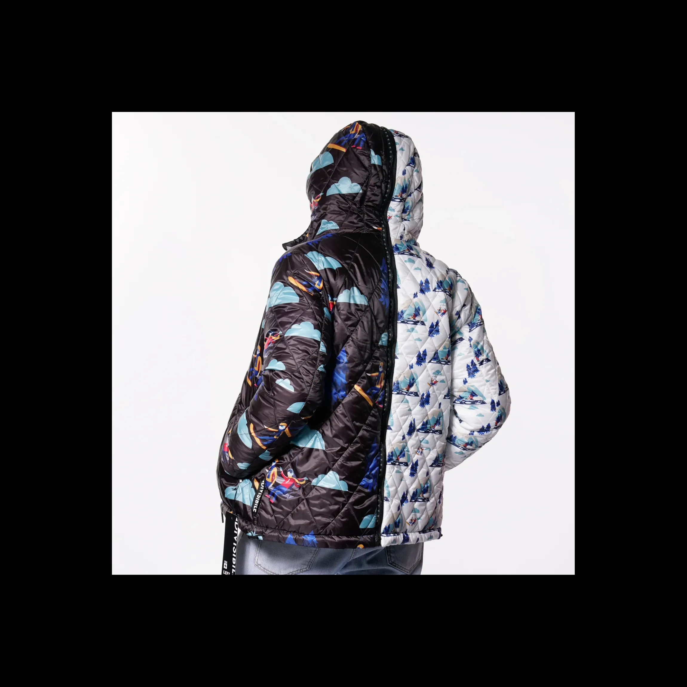 piumino_divisibile_double_1.webp Piumino DIVISIBILE double face