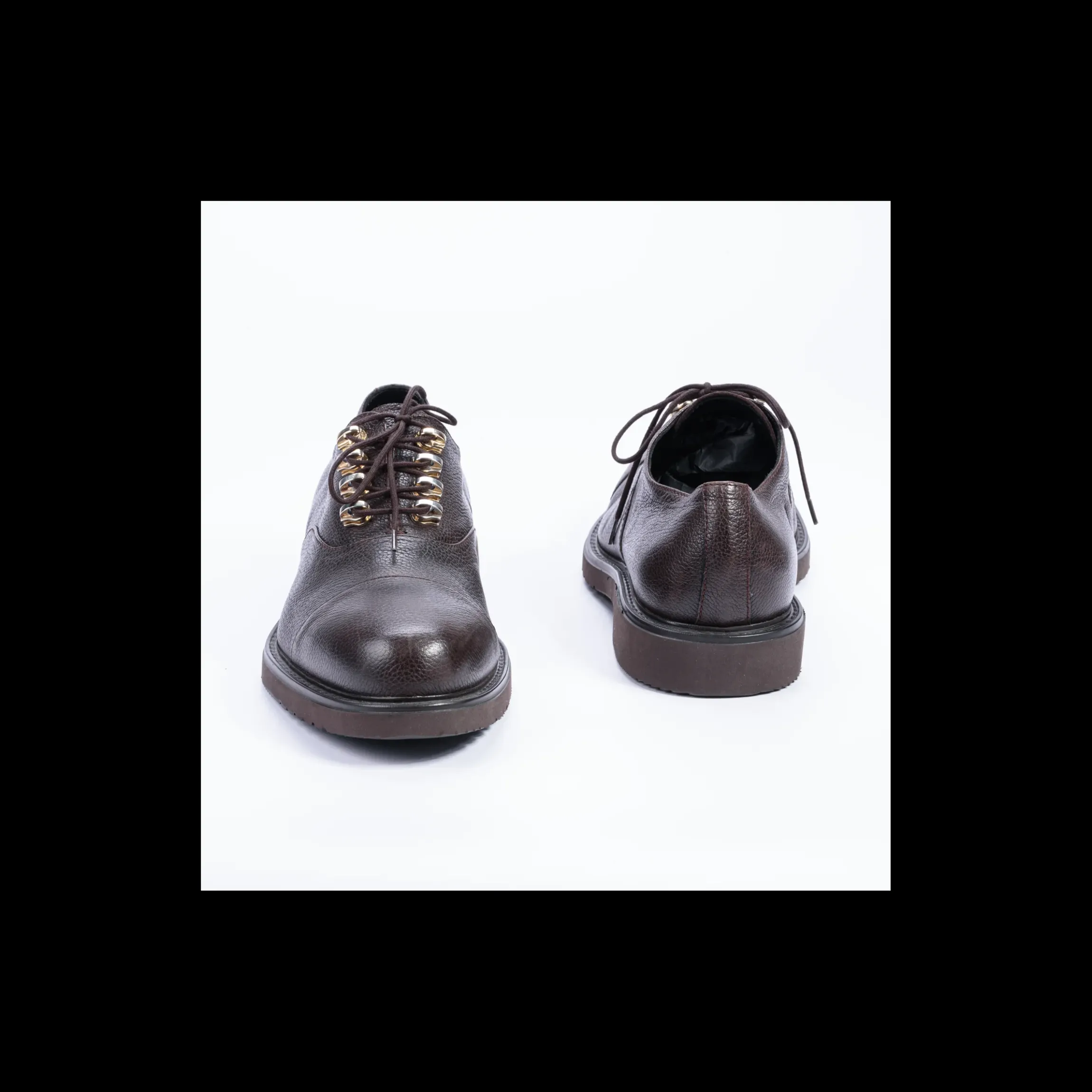 stringata_cesare_paciotti_1.webp STRINGATA CESARE PACIOTTI IN PELLE MARTELLATA TESTA DI MORO